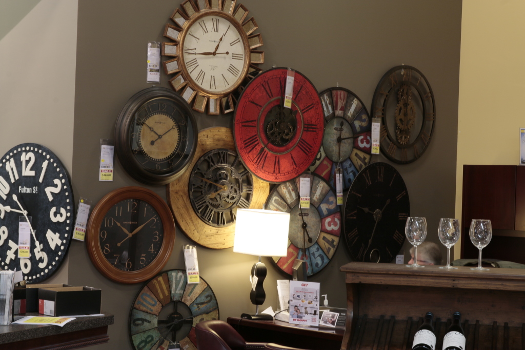 Wall clock grouping at Stoney Creek Furniture